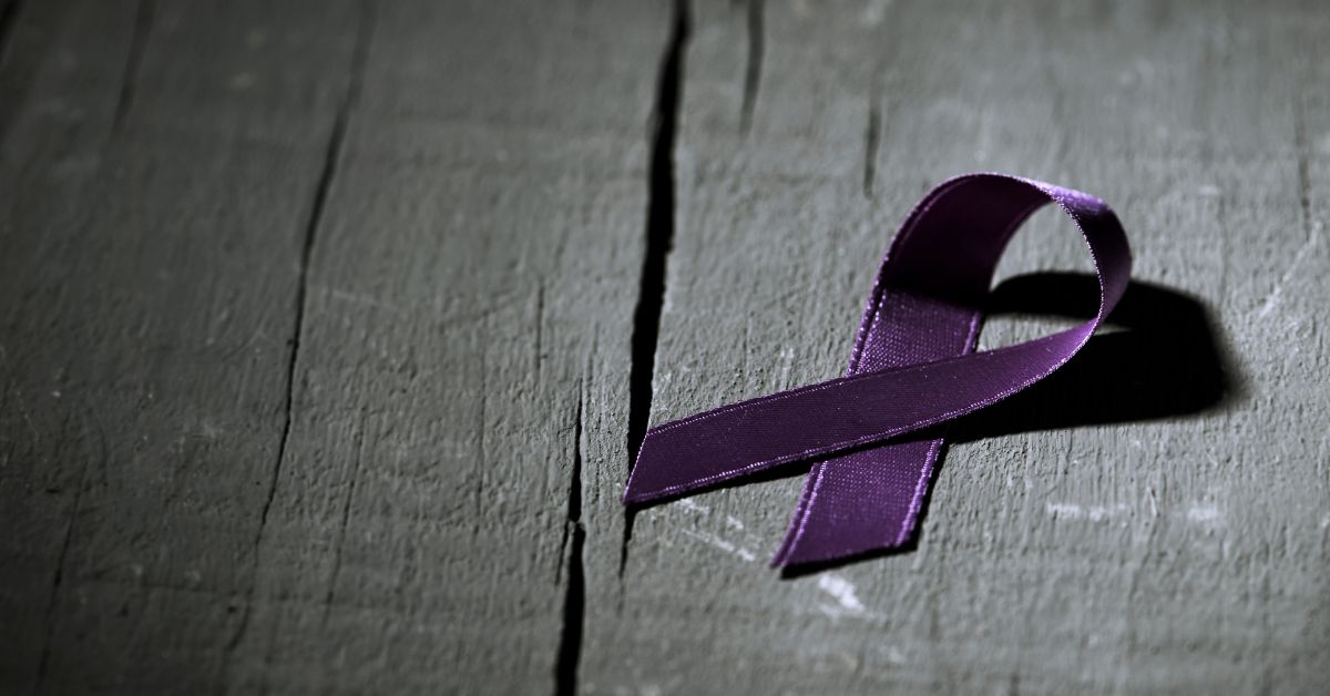 Blog banner with text "Shining a Light on the Intersection of Brain Injury and Domestic Abuse"