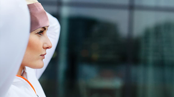 Woman wearing pink Neurovine headband